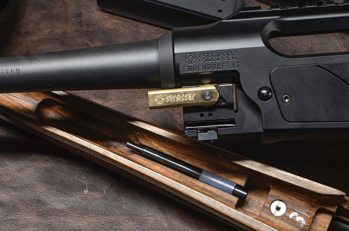 The barrel locking system employs a lever, with an extension rod stowed in the forend.